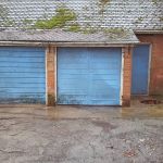 Pair of Up & Over Doors Replaced with Basic Steel (Before)