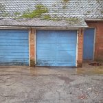 Pair of Up & Over Doors Replaced with Basic Steel (Before)
